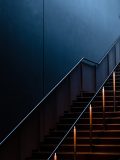 一耽漫画都市甜宠类作品封面，现代都市背景，两位男主角靠近，暖色调温馨氛围